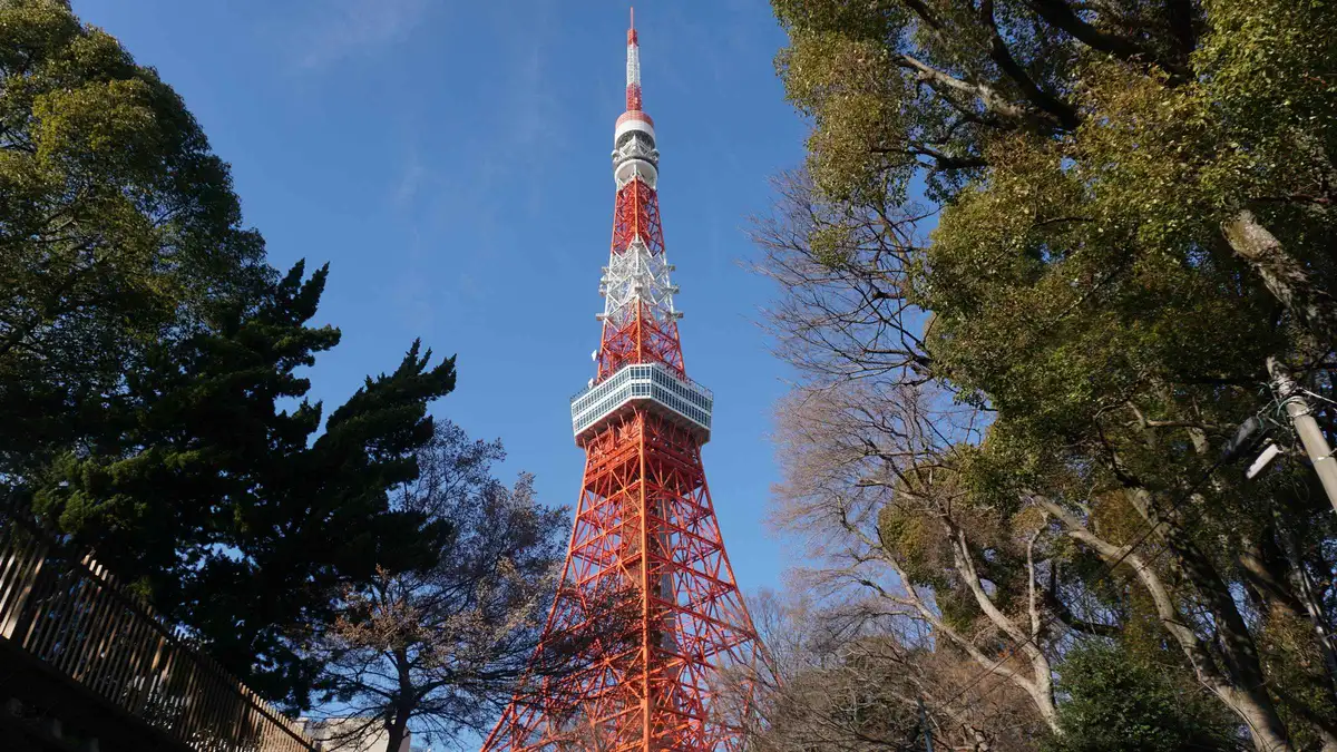 Tokyo Tower seen from a quiet side street, the kind of viewpoint used on a Tokyo Tower photo spots walk
