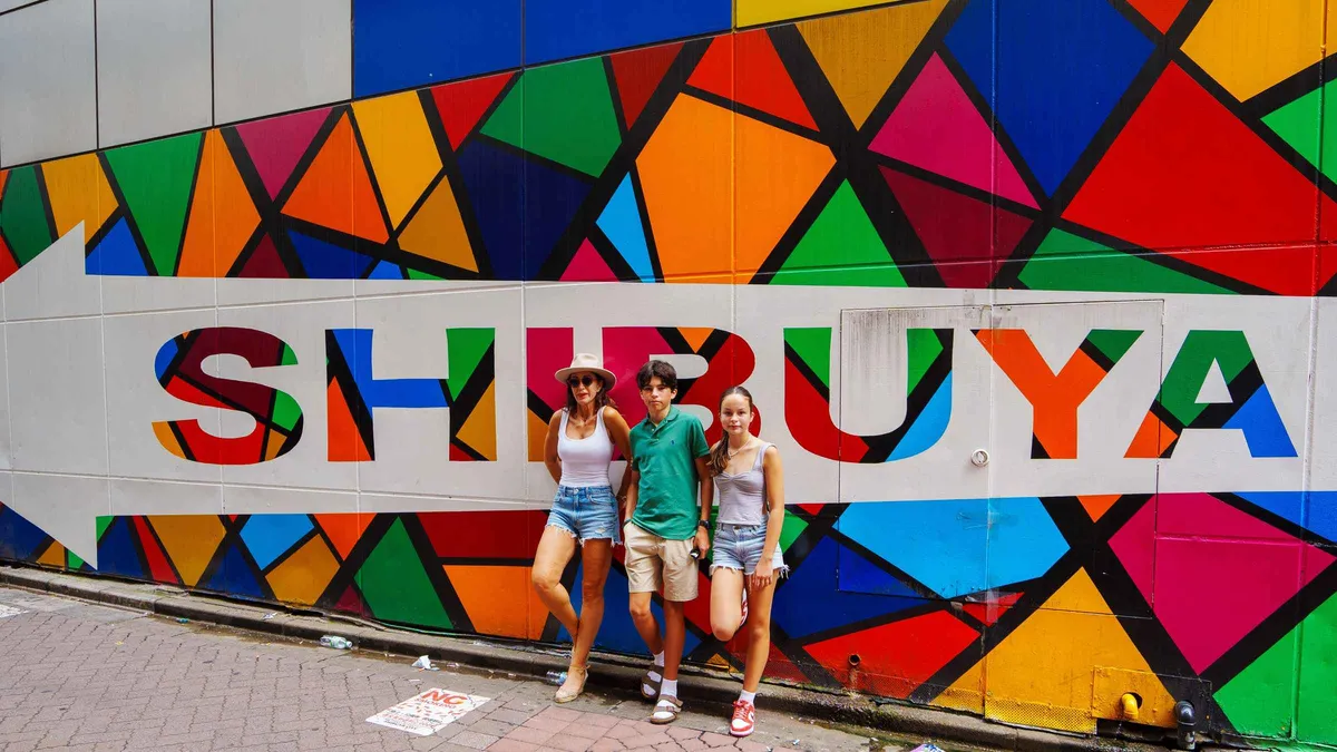 Family posing for a private Tokyo photoshoot at the Shibuya Scramble Crossing